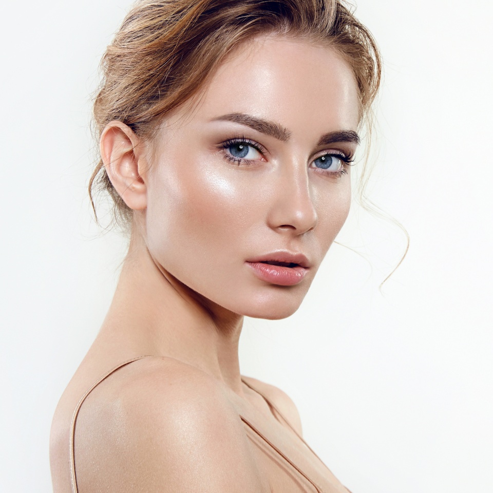 Portrait of a young woman with natural makeup and natural styling.Advertising natural cosmetics.Advertising for a beauty salon.Care cosmetics, face and body skin care.