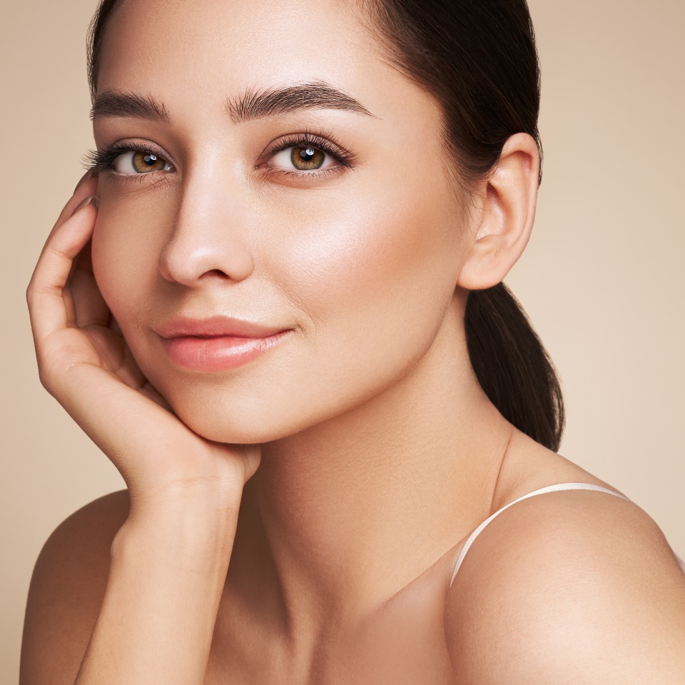 Portrait beautiful young woman with clean fresh skin. Model with healthy skin, close up portrait. Cosmetology, beauty and spa