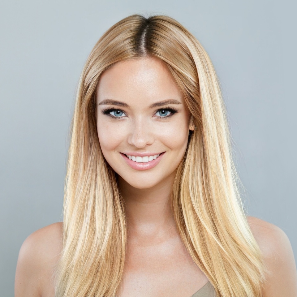 Blonde model woman with natural make-up, healthy skin and long hair. Female beauty, cosmetology and skincare concept